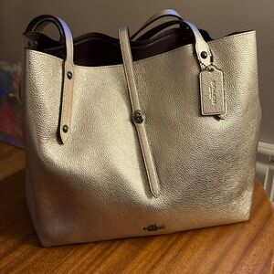 COACH Market Tote in Gold Polished Pebble
Leather NWOT w/dust bag